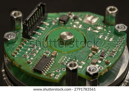 Detail of an uncovered part of an encoder printed circuit board.