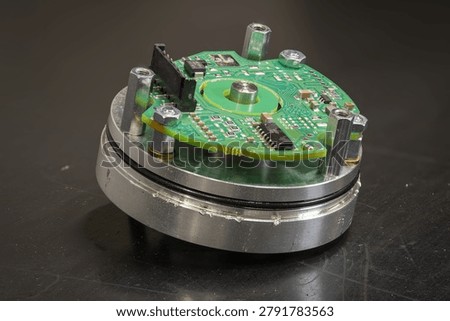 Detail of an uncovered part of an encoder printed circuit board.