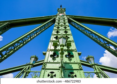Detail with upper section of the Chain Bridge, a steel bridge painted green in Budapest, Hungary - Shutterstock ID 486722983