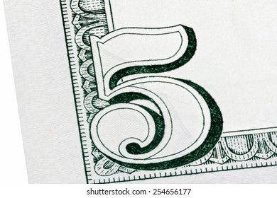 Detail Of U.S. Five Dollar Bill, Isolated End Stacked.