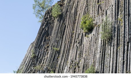 Detail of the vertical basalt columns, in Zlaty vrch, Czechia - Shutterstock ID 1945773838
