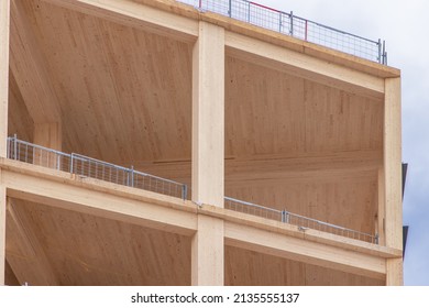 Detail Of The Vertical Supports And Interior Ceiling Of A Mass (solid) Timber Multi Story Green, Sustainable Commercial Building Construction Project