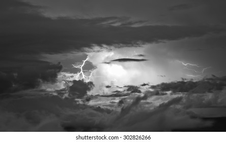 Detail Of A Very Active Thunderstorm, With A Lightning, In Venezuela. Cumulonimbus Cloud Type. Black And White