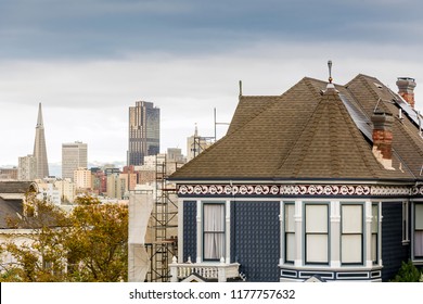 Detail Of A Victorian House With San Francisco Skyline In The Background