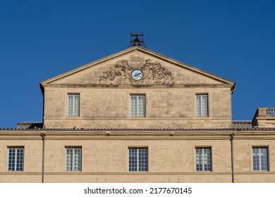 Detail view of the ancient stone facade of Hotel de Massilian, an historic building home of the Musee Fabre, a famous landmark of Montpellier, France