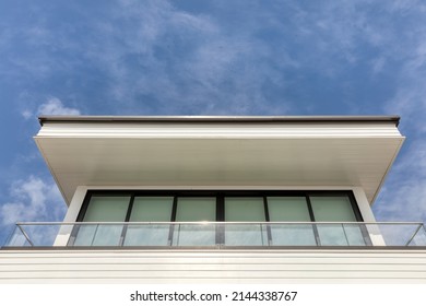 Detail View Of Modern House Windows And Roof Trim