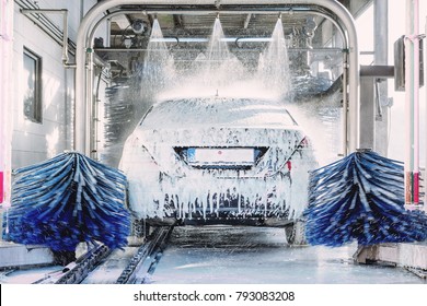 detail view on car wash, car wash foam water, Automatic car wash in action - Shutterstock ID 793083208