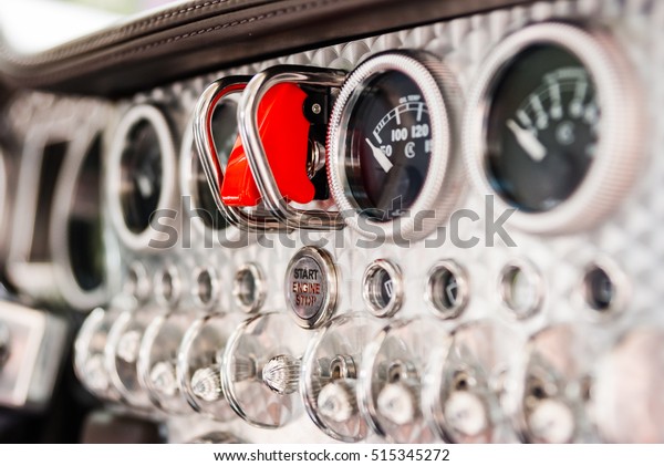 Detail of vintage racing cars cockpit with\
aluminum parts and designd by plane\
details