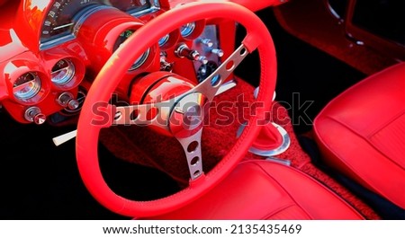 Detail of vintage red sportscar sports car with sporty leather interior