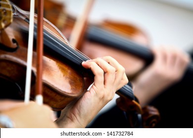 Detail Of Violin Being Played By A Musician