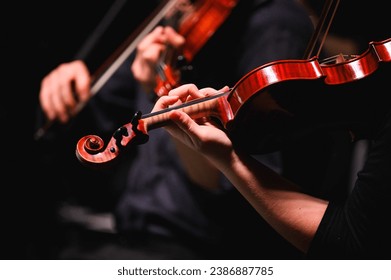 detail of a violin during an orchestra concert