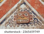 Detail of wall mural in Huaca de la Luna (Pyramid of the Moon). Huacas de Moche. Portrait of chief god Ai Apaec, Trujillo, Peru.