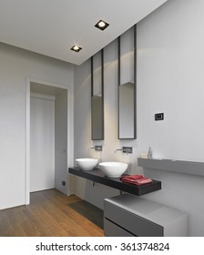 Detail Of Washbasin On The Woos Worktop In The Modern Bathroom With Wood Floor