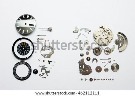 Detail of watch machinery on the table.