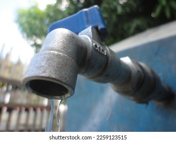 Detail of water faucet with water drops - Shutterstock ID 2259123515