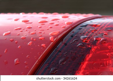 Detail Of Wet Red Car