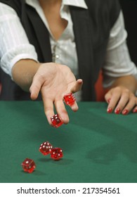 Detail Of Woman Rolling Dice