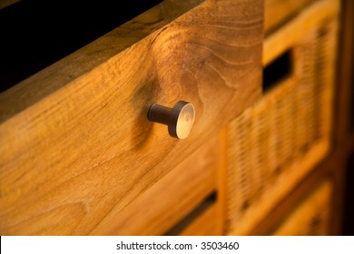 Detail Of Wooden Furniture With Drawers