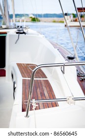 Detail of wooden seats or bench on the top deck of a fancy sailboat/ Seats on sailboat
