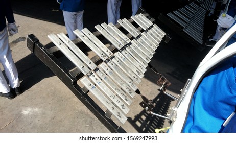 Detail Xilofono Or Xylophone In Red And White Uniform , Glockenspiel, Marching Bell, Marching Band Instrument 