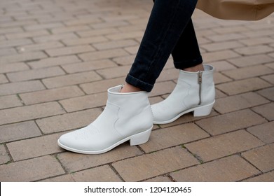 Detail Of Young Fashion Woman On The City Street . White Cowboy Boots .