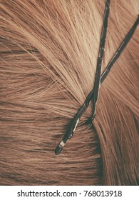 Detailed Close Up Of Brown, Dark Blonde Hair In Ponytail With Clips. Hairdo Surface.