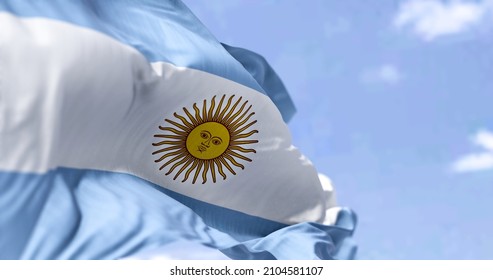 Detailed close up of the national flag of Argentina waving in the wind on a clear day. Democracy and politics. South american country. Selective focus. - Shutterstock ID 2104581107