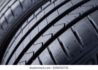 Detailed close up of tread pattern on new summer car tire