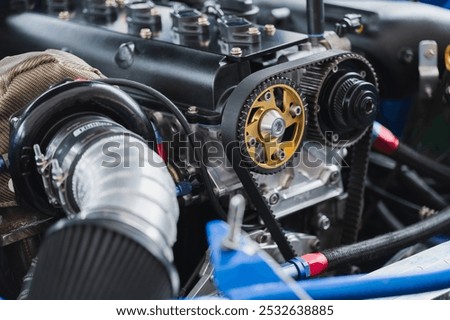 Detailed close-up of high-performance engine advanced automotive engineering image highlights critical components, precision and innovation in automotive design