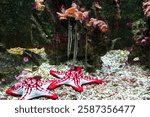 A detailed close-up of two Red-knobbed starfish, also known as Protoreaster nodosus, showcasing their unique texture and vibrant colors.