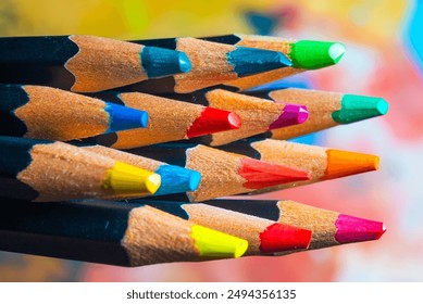 Detailed close-up of a vibrant assortment of colored pencils arranged neatly, showcasing their rich hues and fine textures, highlighting their artistic potential and craftsmanship - Powered by Shutterstock