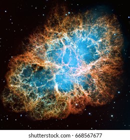 Detailed image of the Crab Nebula in constellation Taurus, blue and orange colors, elements of this image furnished by NASA