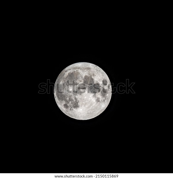 Detailed image of the\
full moon. Full moon against the black night sky. Full moon\
background isolated on\
black