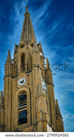 Detailed Low Angle View of Neogothic Limestone Bell Tower in Gozo