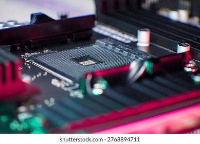 Detailed macro image showcasing an empty CPU socket on a computer motherboard, surrounded by capacitors and memory slots. RGB lighting highlights the intricate electronic components, emphasizing the p