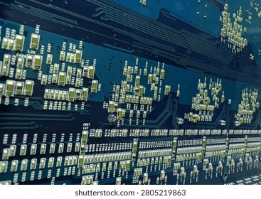 Detailed macro shot showcasing the complex blue circuit board with numerous glowing electronic components and pathways