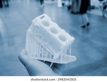 Detailed models in form of internal combustion engine printed on 3D printer from polymer close-up. Detailed object created by 3D printer using 3D printing method. Concept 3D Printing. SLA technology