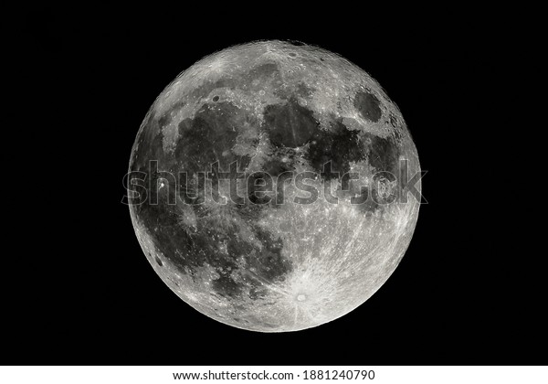 Detailed shot of the full Moon at shot\
at 1600mm focal length, high contrast surface\
features