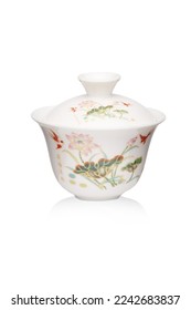Detailed shot of a white original porcelain color printed gaiwan in chinese style. The designer bowl with a lid is isolated on the white background. - Shutterstock ID 2242683837
