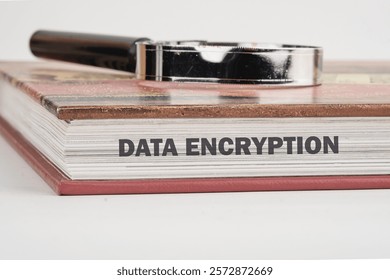 A detailed study guide on data encryption is placed on a surface alongside a magnifying glass, highlighting the significance of understanding security in technology.