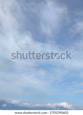 Detailed Texture of Light Wispy Clouds in the Sky