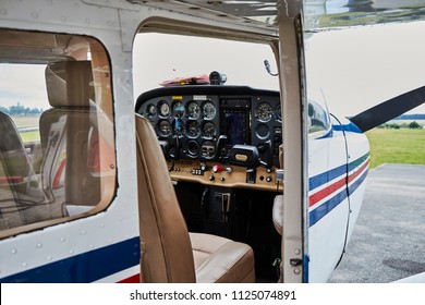 Detailed view of Cessna airplane interior standing on a runway.