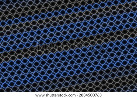 Detailed view of a hexagonal mesh pattern with blue and black tones, textured background