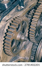 Detailed view of interlocking metal cogs and gears in a mechanical device. Industrial engineering