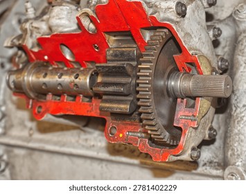 Detailed view of interlocking metal cogs and gears in a mechanical device. Industrial engineering