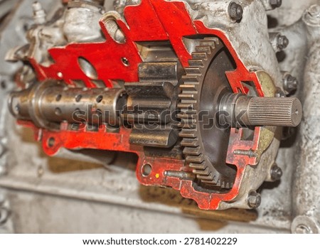 Detailed view of interlocking metal cogs and gears in a mechanical device. Industrial engineering