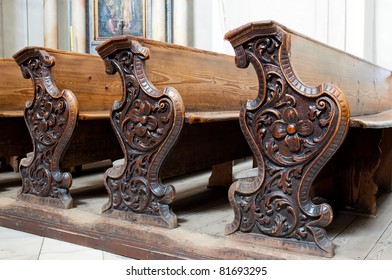 Detailed View Of An Old Wooden Church Pews.