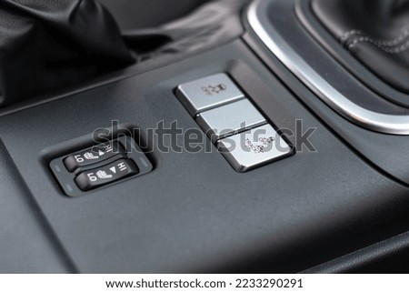 Detailed view on buttons of sport car