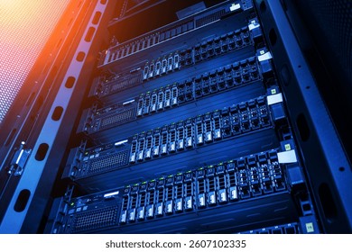 A detailed view of a server rack featuring advanced network equipment in a modern data center. The image showcases the organization and technology of server systems.