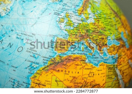detailed world map displayed on a globe. destination Spain